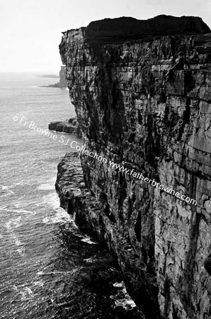 CLIFFS RISING FROM THE SEA